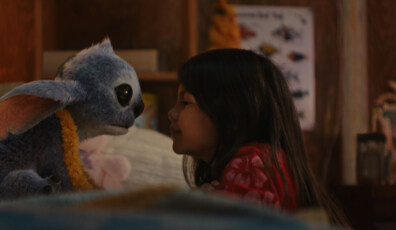 (L-R) Stitch and Maia Kealoha as Lilo in Disney’s live-action LILO & STITCH. Photo courtesy of Disney. © 2025 Disney Enterprises Inc. All Rights Reserved.