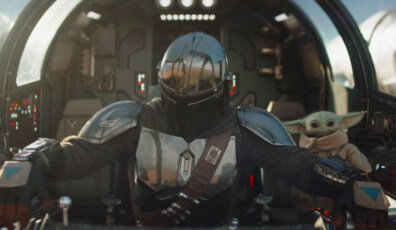(L-R) Mandalorian (Pedro Pascal) and Grogu in Lucasfilm's THE MANDALORIAN & GROGU. Photo courtesy of Lucasfilm. © 2025 Lucasfilm Ltd™. All Rights Reserved.
