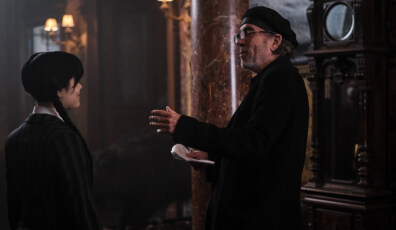 Wednesday. (L to R) Jenna Ortega as Wednesday Addams, Director Tim Burton in Wednesday. Cr. Tomasz Lazar/Netflix © 2022